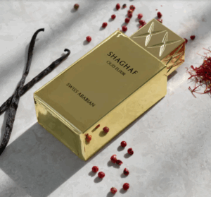 Shaghaf Oud Elixir perfume bottle with deep red glass